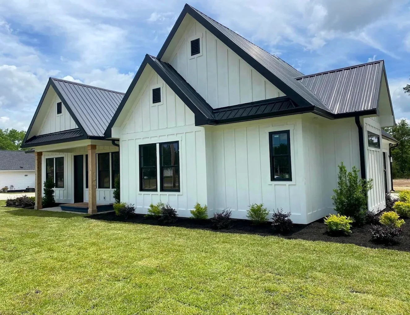 Freshly maintained lawn beside a home
